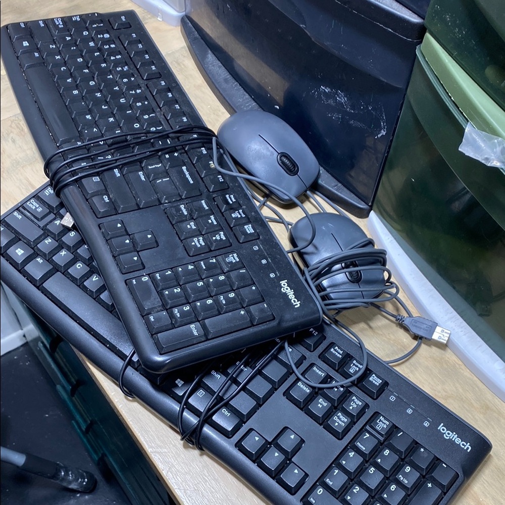 Two pc logitech keyboard and mouse